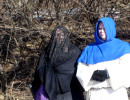 The Widow Aldina Zephyr and Fr. Alister Llewelyn