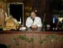 Fr. Edwin Tending Bar