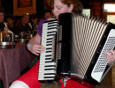 Casmina Playing an Accordian